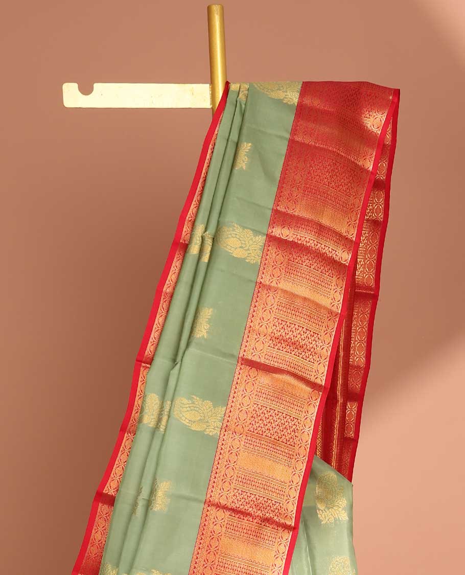 Green floral buttas vasundhara elite silk saree with contrast zari design border & pallu of intricate zari design