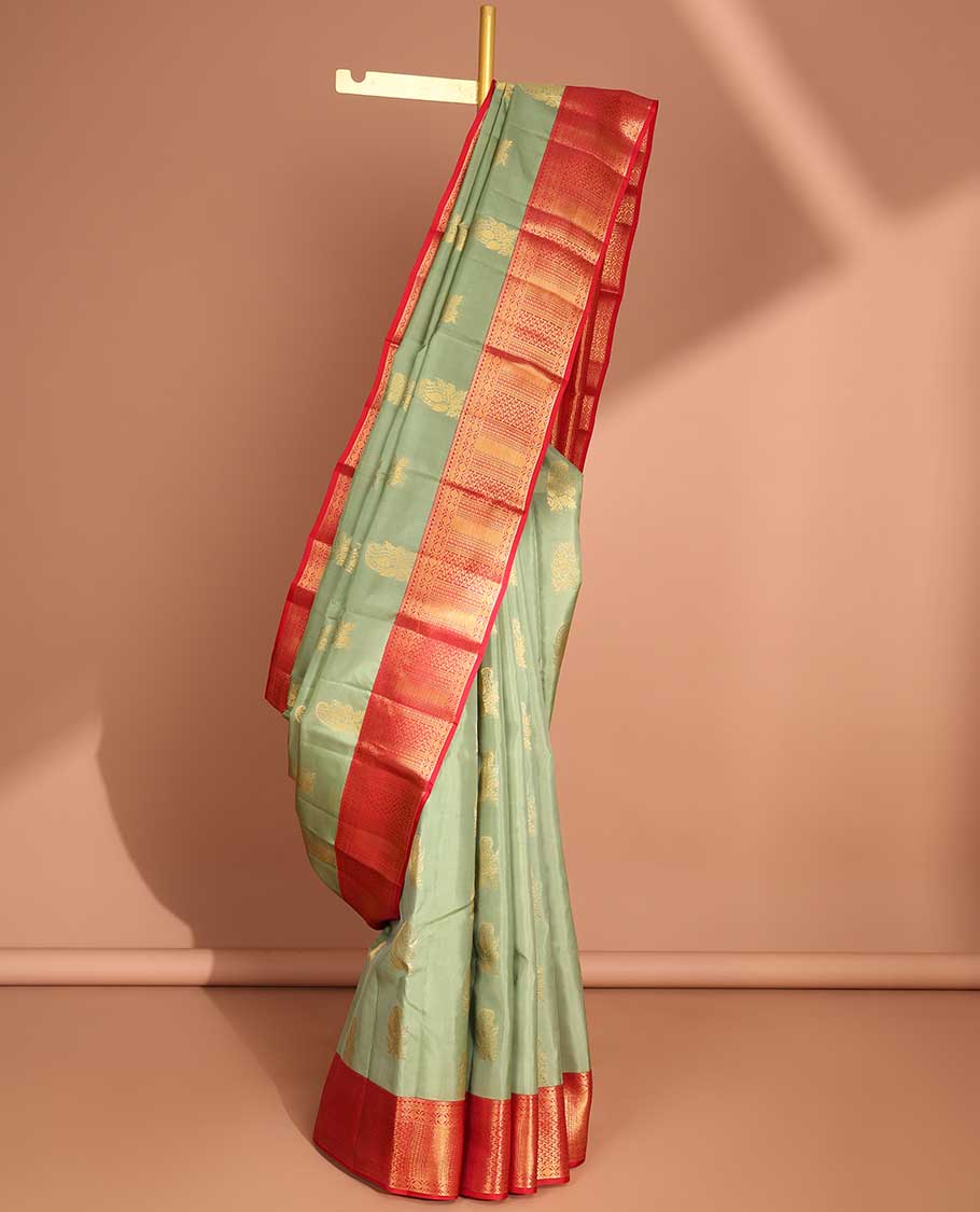 Green floral buttas vasundhara elite silk saree with contrast zari design border & pallu of intricate zari design