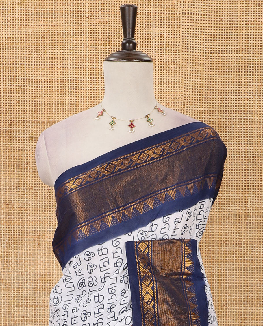 White Tamil letters printed Sungudi cotton saree, contrast traditional zari temple border, striped pallu & contrast plain blouse