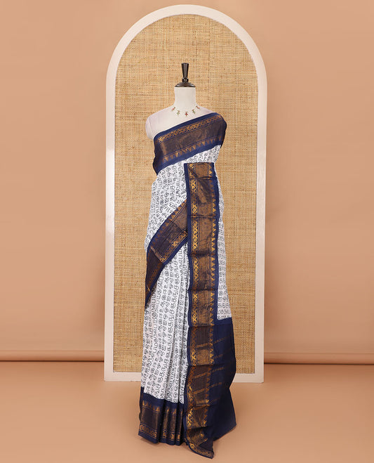 White Tamil letters printed Sungudi cotton saree, contrast traditional zari temple border, striped pallu & contrast plain blouse