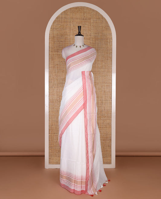 Cream-pink plain design mul mul cotton saree, contrast copper zari horizontally striped border, plain pallu, and plain blouse