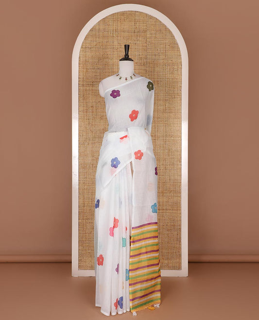 Borderless White colorful five-petal flower motifs printed linen cotton saree, multi-color striped pallu, and contrast printed blouse