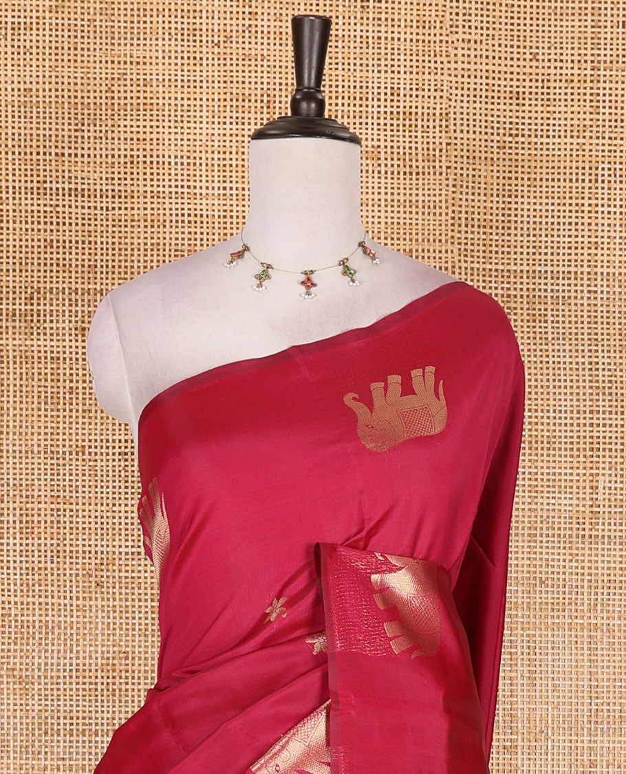 Borderless pink floral and elephant buttas zari woven kanchi silk saree, intricate pallu, and matching zari design blouse
