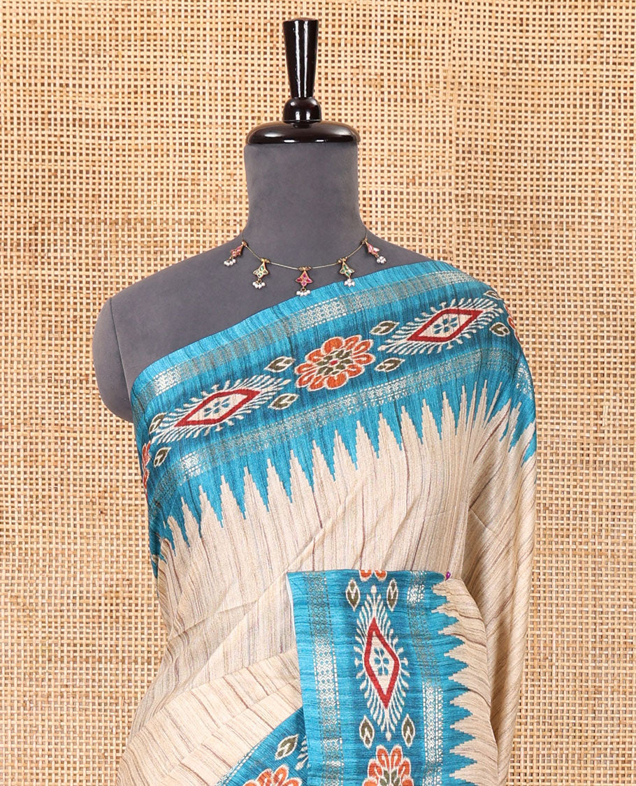 Chikku- blue plain Katan silk saree, contrast ikkat floral-geometric printed temple border, ikkat printed pallu, and ikkat printed blouse