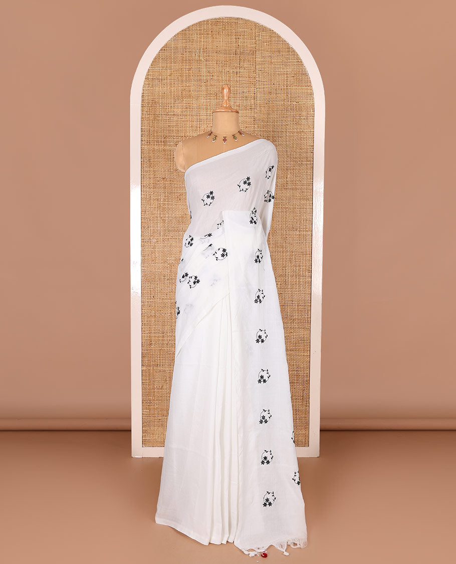 Borderless white and black floral motifs embroidered Khadi mul cotton saree with a matching plain blouse