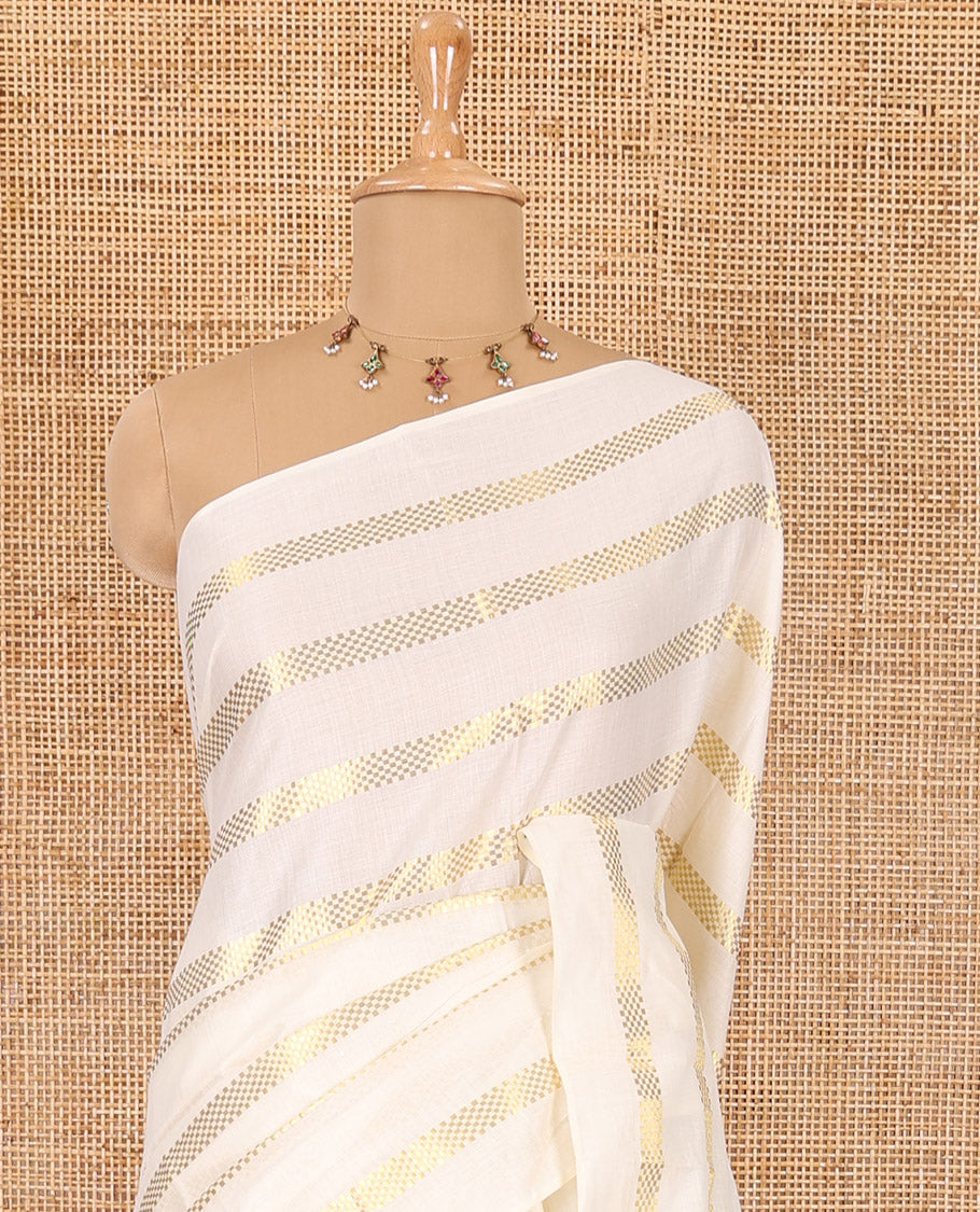 Borderless cream and olive green horizontal muthu zari striped Kerala cotton saree, self-pallu with tassels, and a matching blouse