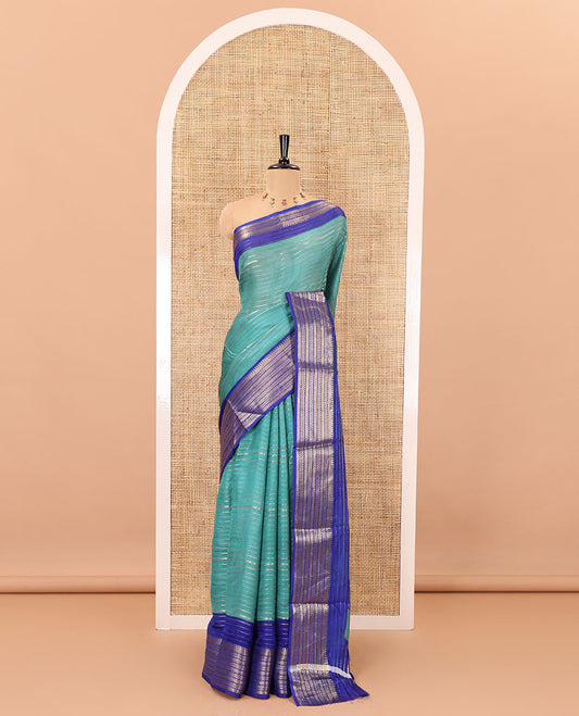 Rama horizontal zari striped moss chiffon saree, contrast traditional zari border, striped pallu, and a contrast zari design blouse