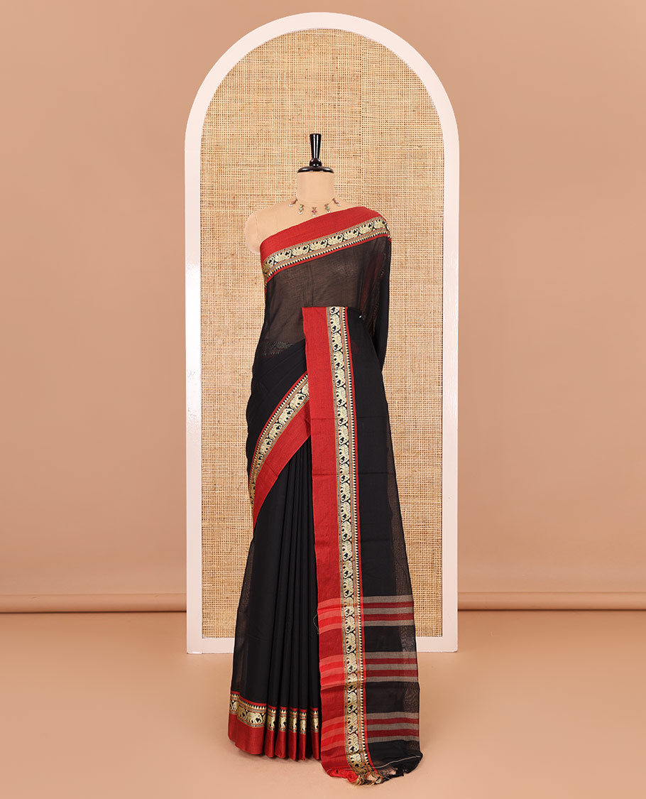 Black plain mercerised cotton saree, contrast kal erangina thread border of elephant motifs, striped pallu, and a matching blouse
