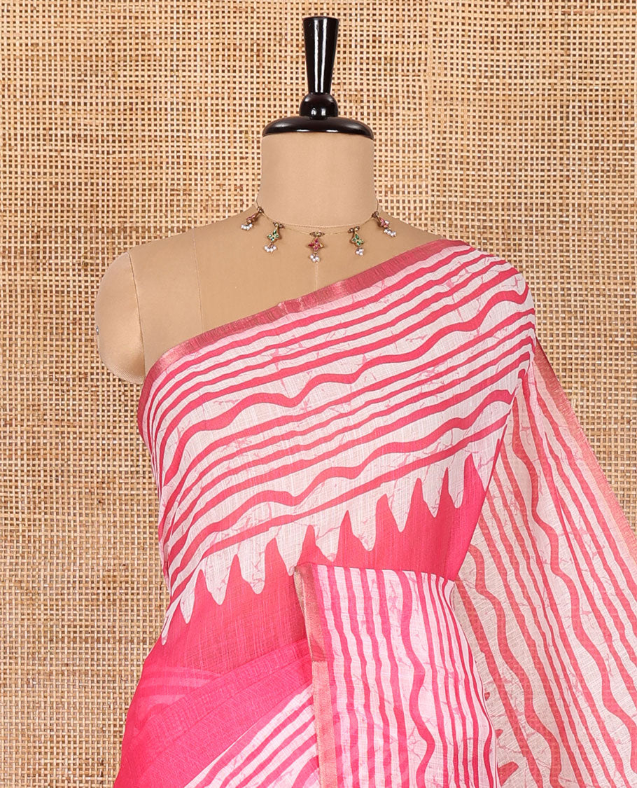 Pink plain linen cotton saree, temple zig-zag striped batik printed border, batik printed pallu, and triangle motifs batik printed blouse