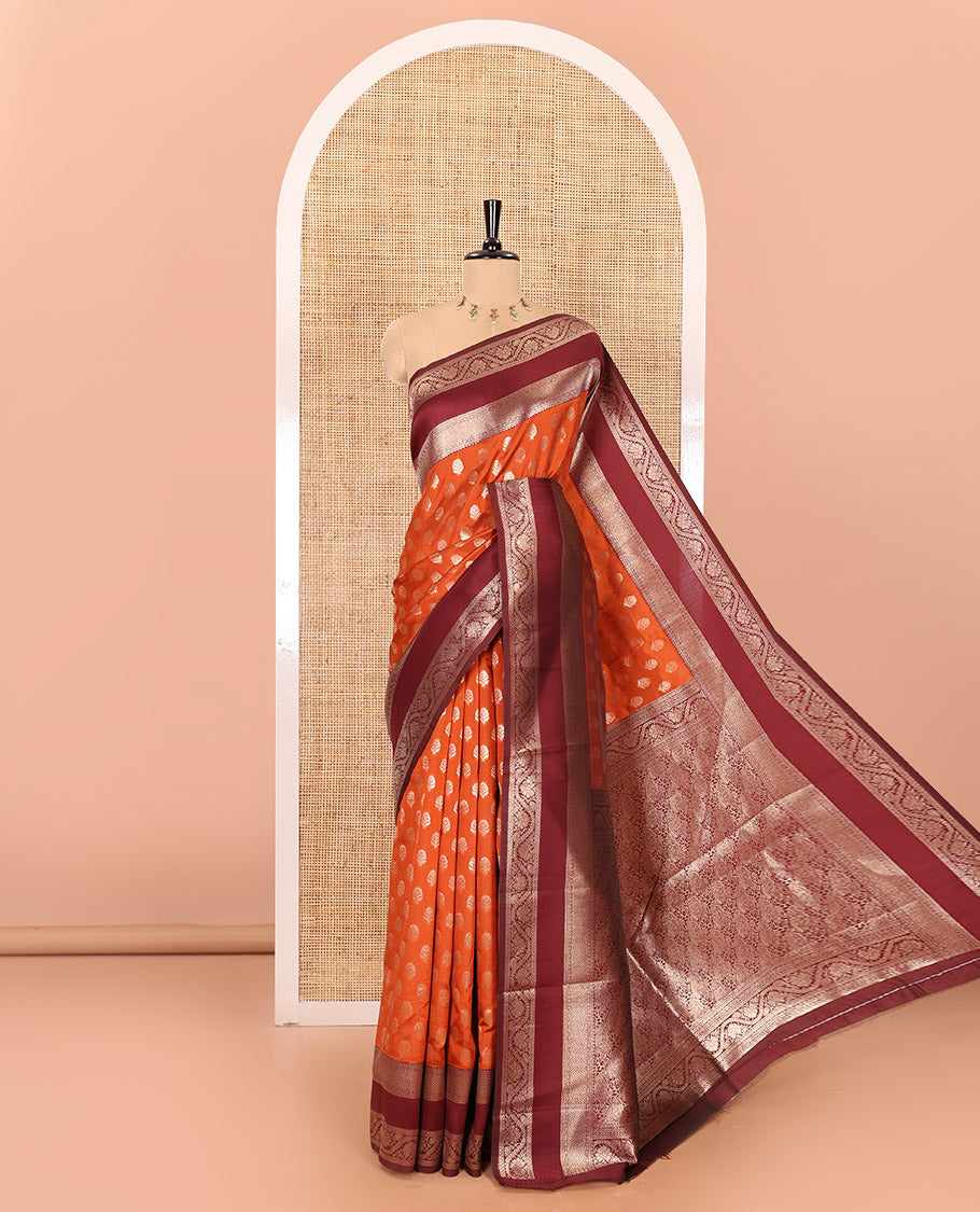 Rust orange zari floral buttas kanchi silk saree, contrast traditional floral creeper border, intricate pallu, and a zari design pallu