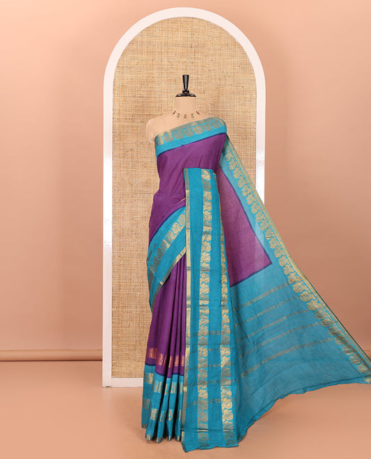 Violet plain sungudi cotton saree with contrast traditional border of peacocks, zari striped pallu, and a contrast zari checked blouse