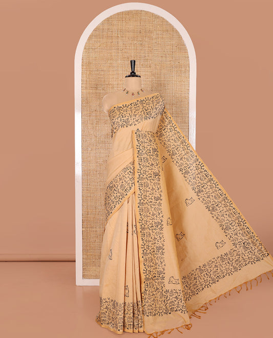 Chikku South Cotton Saree Bedecked with Cat Motifs Printed All Over Its Body, Subtly Sparked with Warli Village Theme Printed Border, and Paired with a Contrast Warli Printed Blouse