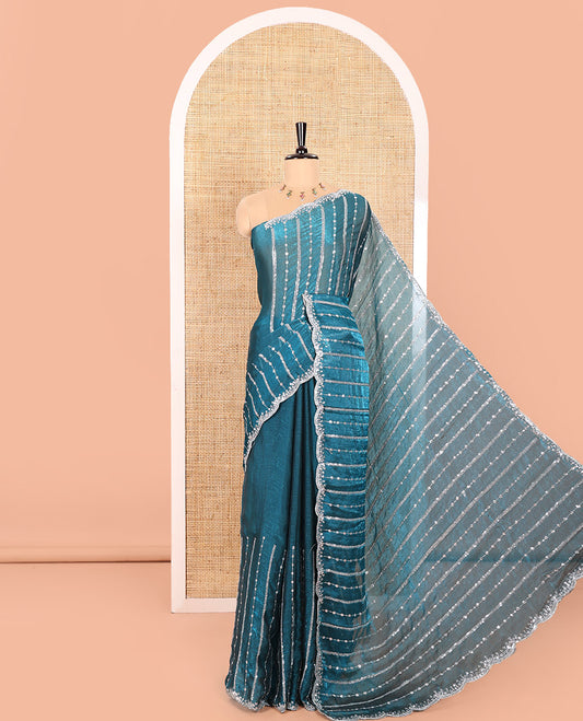 Blue Fendy Chiffon Saree Highlighted with Sequins and Thread Stripes Embroidery, Scallop Embroidered Border, Elegantly Embroidered Pallu, and Paired with a Matching Blouse