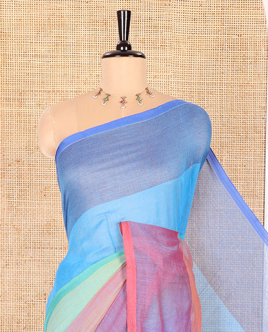 Borderless Multi-Colored Khadi Mul Cotton Saree Accentuated with Rainbow-Style Stripes All Over the Saree, Subtly Sparkled Colorful Tassels, and Paired with a Matching Blouse