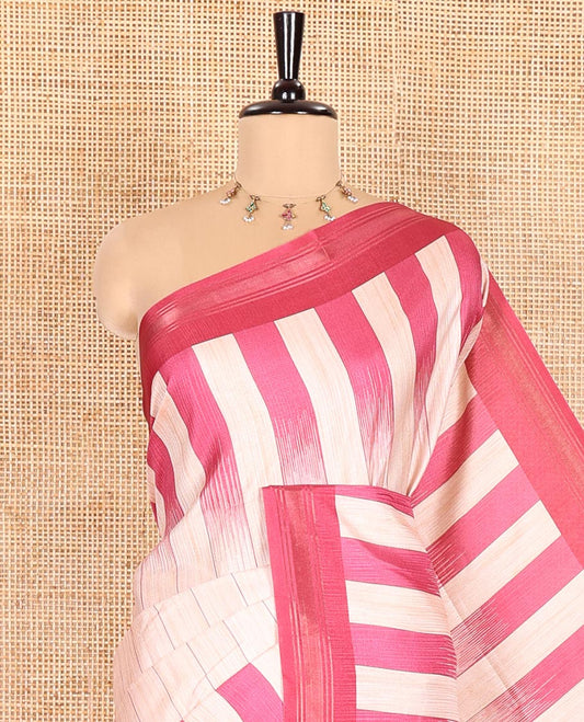 Chikku Manipuri Silk Saree, Subtly Woven with Vertical Stripes All Over Its Body, Complemented by Contrast Zari Border, Sparsely Striped Pallu, and Paired with a Contrast Blouse