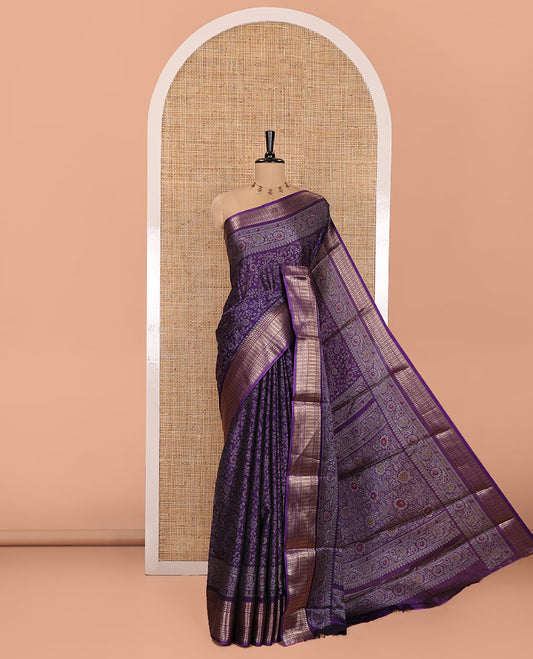 Dark Violet Dola Silk Saree, Subtly Designed with Floral Jaal Print All Over Its Body, Highlighted by Traditional Zari Designs Woven Border, Pallu Replicates the Same Body Print, and Comes with a Matching Blouse