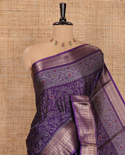 Dark Violet Dola Silk Saree, Subtly Designed with Floral Jaal Print All Over Its Body, Highlighted by Traditional Zari Designs Woven Border, Pallu Replicates the Same Body Print, and Comes with a Matching Blouse