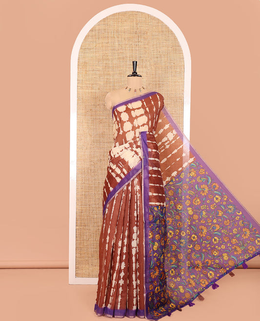 Coffee Brown Mercerised Cotton Saree, Adorned with Shibori Printed on Its Body, Complemented by a Contrast Border, Pallu Steeped with Colorful Floral Print, and Paired with a Contrast Printed Blouse