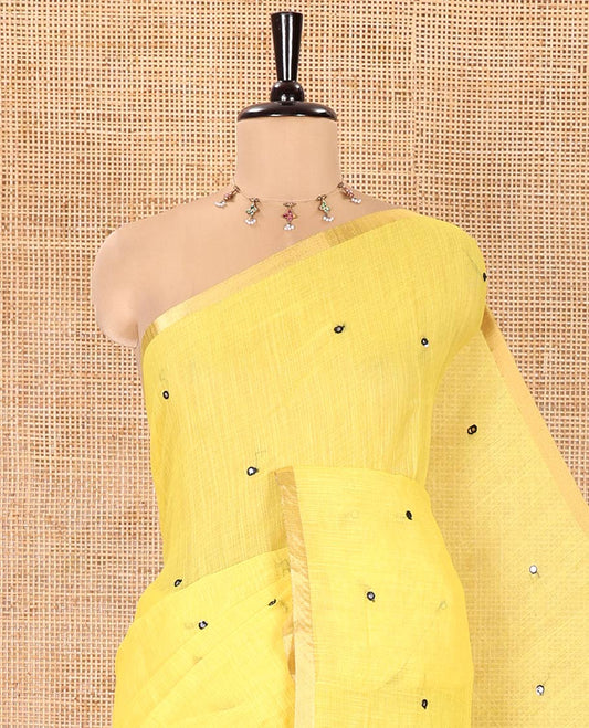 Yellow Linen Cotton Saree, Graced with Mirror Work Across Its Body, Subtly Piping Border, Contrast Pallu Steeped with Stripes, and Mirror Work, and Paired with a Contrast Vertical Stripes Printed Blouse