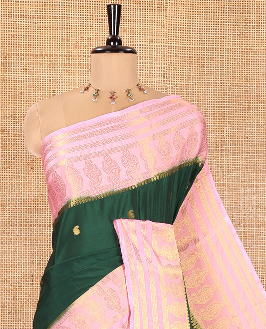 Green Art Mysore Silk Saree, Gleamed Up with Paisley Buttas All Over Its Body, Complemented by a Contrast  Traditional Zari Border of Paisleys, Subtly Striped Pallu, and Paired with a Contrast Blouse