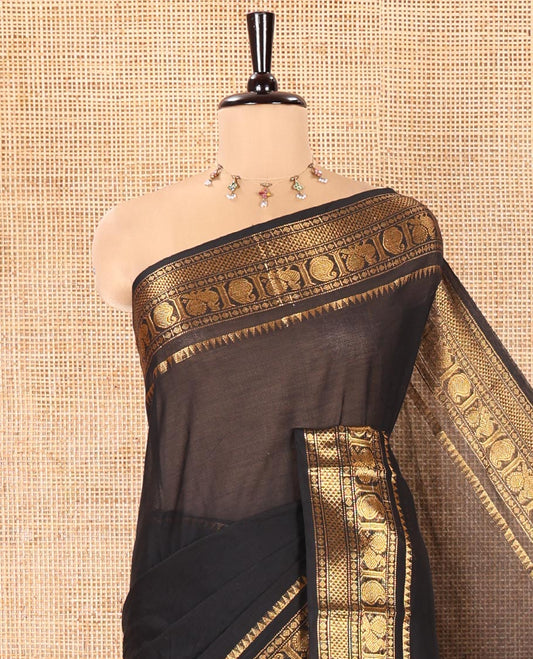 Black Plain Chettinad Cotton Saree, Highlighted by a Zari Traditional Border of Peacock and Paisley Designs, Subtly Striped Pallu, and Paired with a Matching Blouse