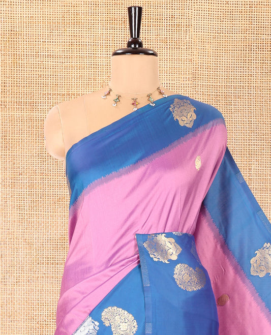 Pink Elite Soft Silk Saree, Embellished with Zari Buttas All Over Its Body, Complemented by Contrast Border Steeped with Zari Buttas, Grand Jaal Design Pallu, and Paired with a Contrast Blouse
