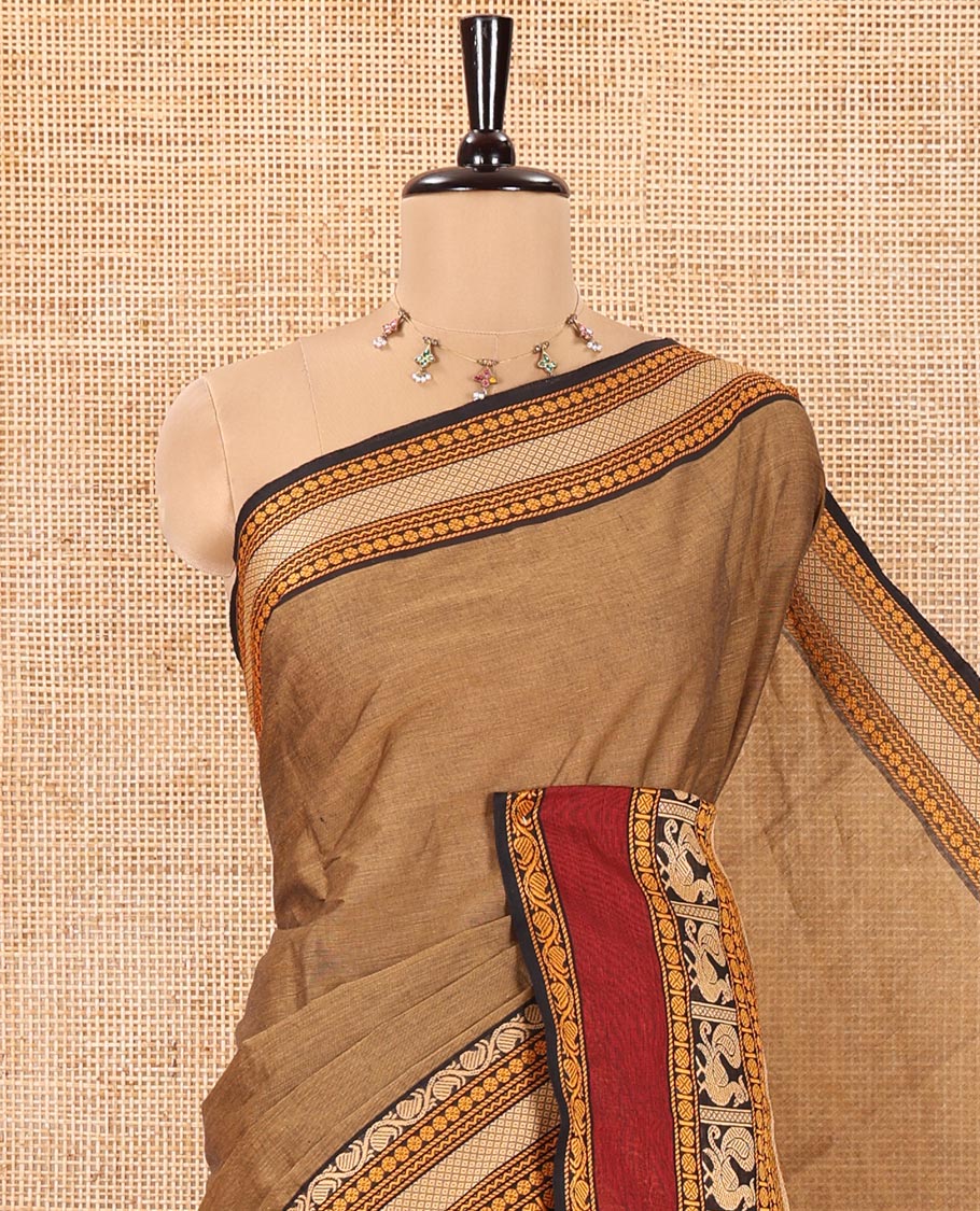 Light Brown Plain Chettinad Cotton Saree, Complemented by a Contrast Traditional Design Rettai Pettu Border of Peacock Designs, Subtly Striped Pallu, and Comes Without a Blouse