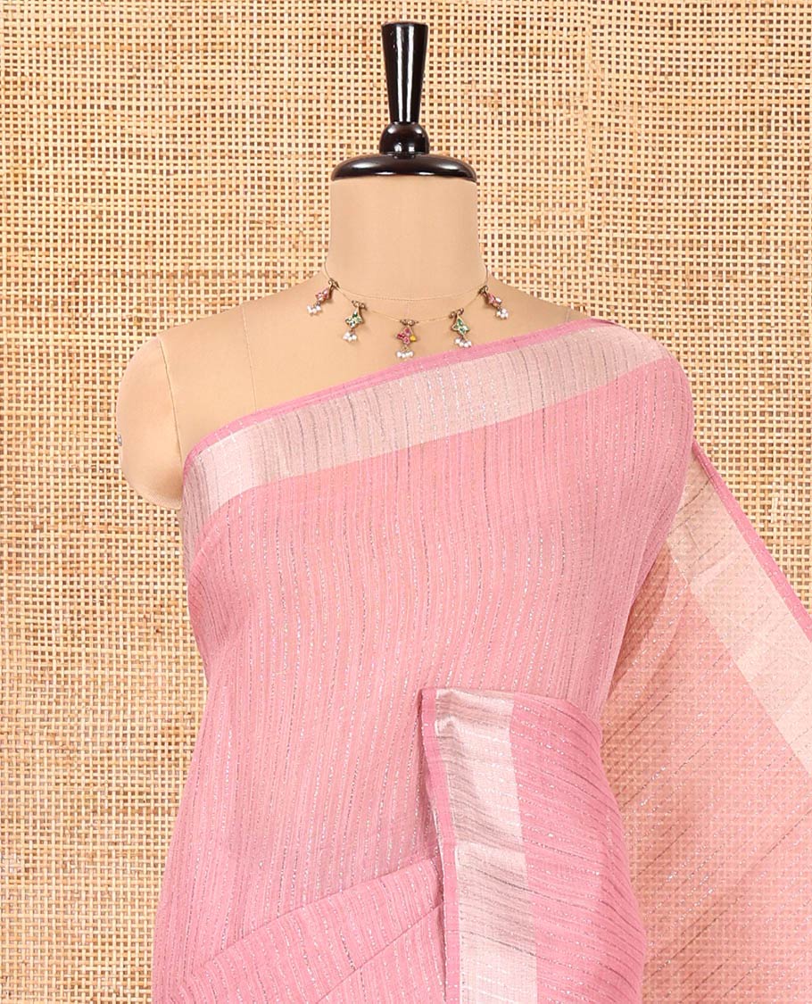 Onion Pink Linen Zari Cotton Saree, Gleamed Up with Zari Stripes All Over Its Body, a Subtle Zari Border, a Self-Pallu, and Comes Without a Blouse