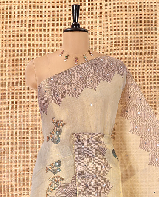 Cream Tissue Saree, Ornamented with Floral Buttas and Mirrorwork, a Self-Border, Ogee Print Pallu, and a Matching Blouse