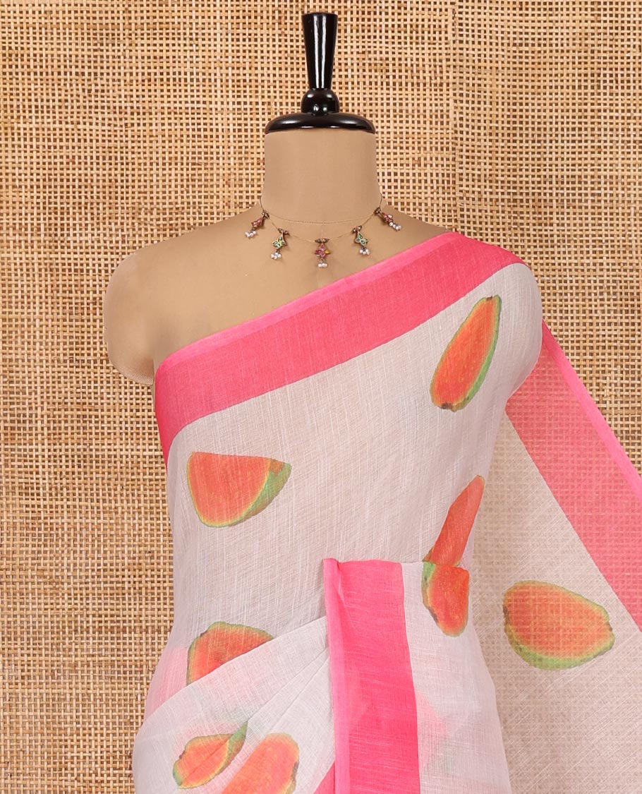 Cream Linen Cotton Saree, Artfully Printed with Guava Motifs All Over Its Body, Complemented by a Contrast Plain Border, Pallu Steeped with Guava Motifs, and Paired with a Contrast Blouse