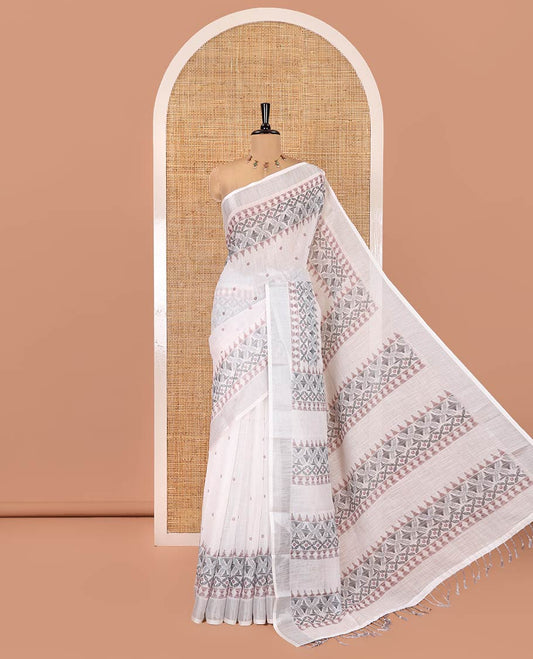 White Linen Saree, Decorated with Buttas and Geometric Print on Its Body, Highlighted by Zari Bavanji Border, Pallu of Same Geometric Print, and Paired with a Contrast Blouse