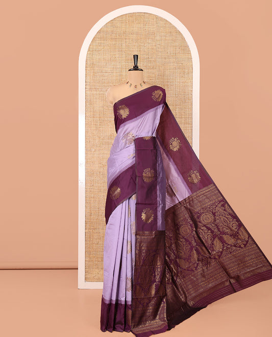 Lavender Art Silk Saree, Gracefully Embellished with Floral Zari Buttas All Over Its Body, Complemented by Contrast Floral Design Border, Intricately Designed Pallu, and Paired with a Contrast Blouse
