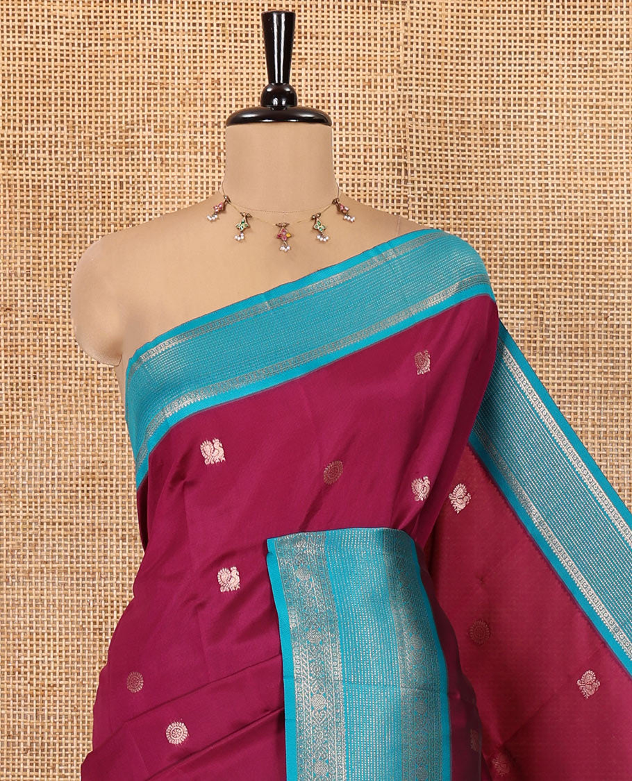 Magenta Kanchi Silk Saree Features Mayil-Chakram Buttas, a Contrast Traditional Border, Jaal Pallu, and a Contrast Blouse