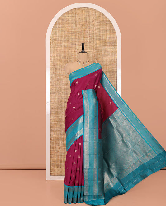 Magenta Kanchi Silk Saree Features Mayil-Chakram Buttas, a Contrast Traditional Border, Jaal Pallu, and a Contrast Blouse