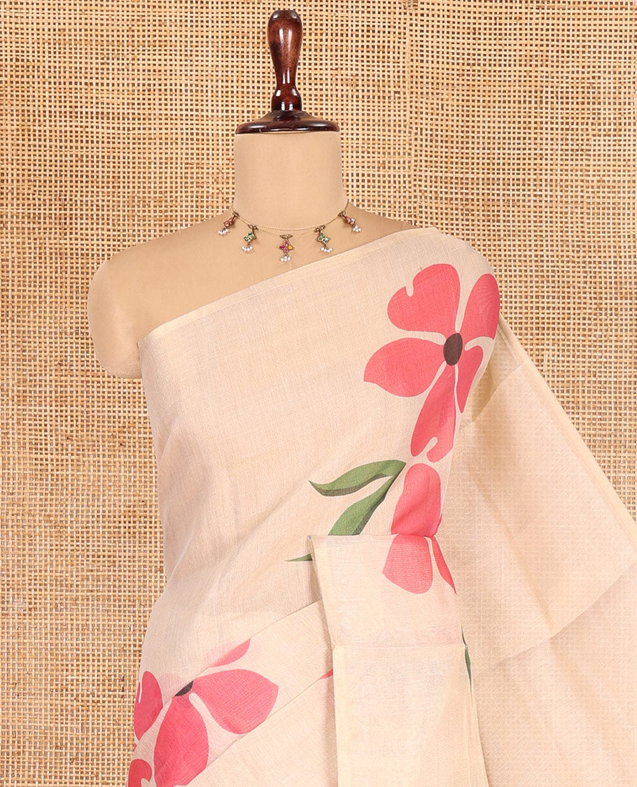 Borderless Cream-Pink Tissue Saree Features Floral Print, a Floral Printed Pallu, and a Contrast Blouse