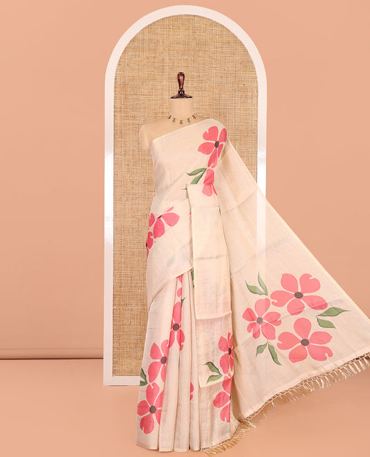 Borderless Cream-Pink Tissue Saree Features Floral Print, a Floral Printed Pallu, and a Contrast Blouse