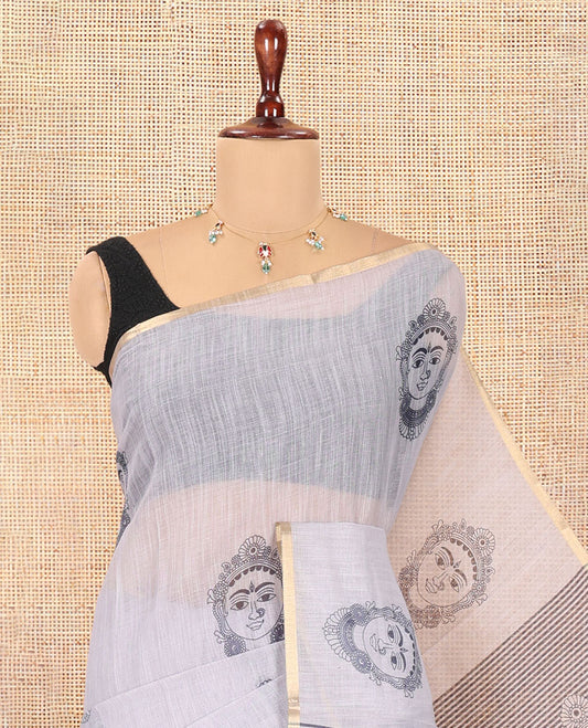 Borderless Grey Linen Cotton Saree, Accentuated with Face Print, Contrast Pallu of Chevron Stripes and Face Print, a Contrast Blouse