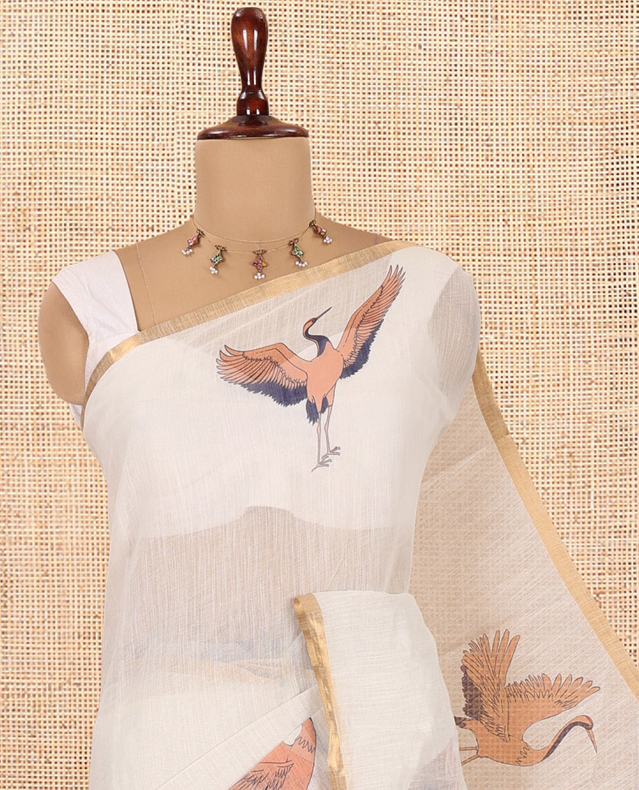 Borderless Cream Linen Cotton Saree, Adorned with Crane Motifs Print, and a Matching Blouse