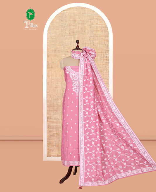 Peach Viscose Muslin Material Churidar Features Buttas Thread Woven Top, a Santoon Bottom, and Floral Jaal Dupatta