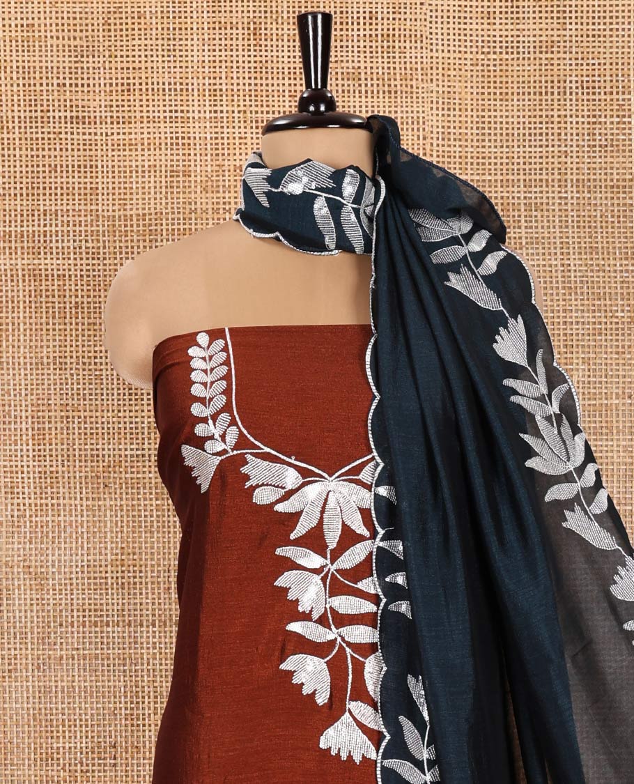 Brown Material Churidar Set, Detailed with Floral Motifs Sequins-Thread Embroidered on Its Vichitra Silk Top, Comes with a Contrast Santoon Bottom, and Paired with a Vichitra Silk Floral Embroidered Scallop Dupatta