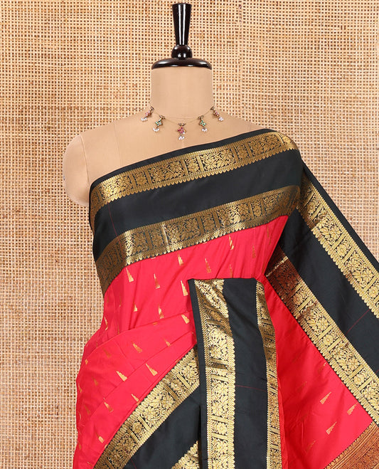 Pink Kanchipuram Budget Silk Saree, Elevated with Temple Zari Buttas All Over Its Body, Complemented by a Contrast Traditional Zari Design Rettai Pettu Border, Opulently Embellished Pallu, and Paired with a Contrast Blouse