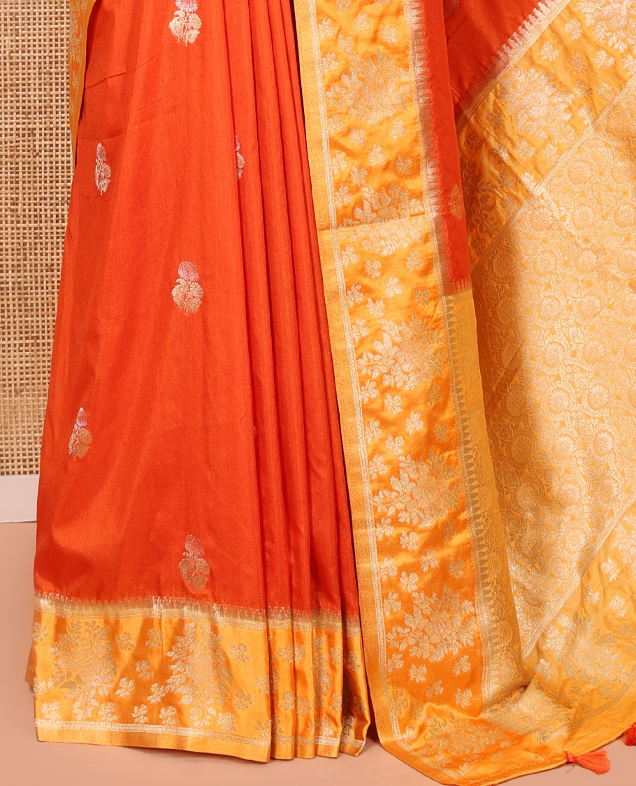 Orange Fancy Raw Silk Saree, Detailed with Floral Zari Buttas, a Contrast Floral Temple Border, Intricate Pallu, and a Contrast Blouse