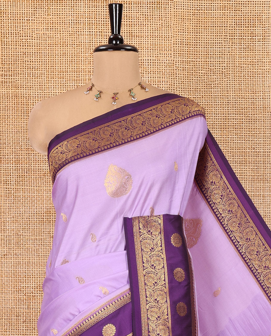 Lavender Art Silk Saree, Elevated with Zari Buttas, a Contrast Traditional Zari Border, Grand Pallu and a Contrast Blouse
