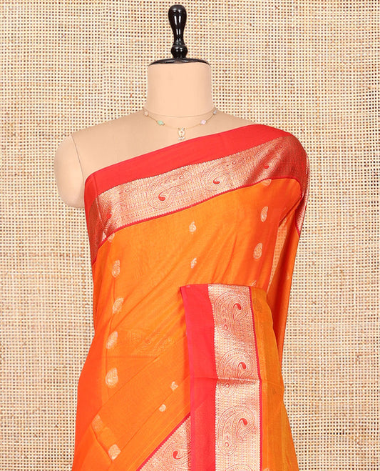 Orange Silk Cotton Saree, Accentuated with Buttas, a Contrast Traditional Zari Paisley Design Border, Pallu of Intricate Designs, and Contrast Blouse