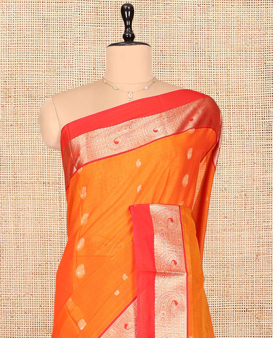 Orange Silk Cotton Saree, Accentuated with Buttas, a Contrast Traditional Zari Paisley Design Border, Pallu of Intricate Designs, and Contrast Blouse
