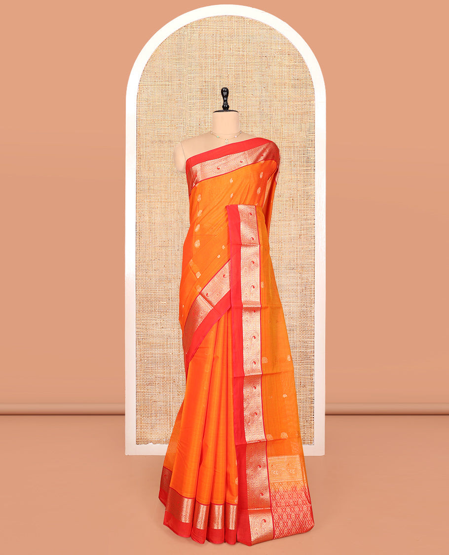 Orange Silk Cotton Saree, Accentuated with Buttas, a Contrast Traditional Zari Paisley Design Border, Pallu of Intricate Designs, and Contrast Blouse