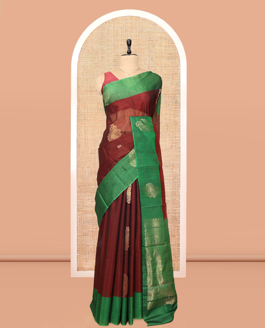 Maroon Cotton Saree, Highlighted by a Zari Leaf Motifs, a Contrast by a Zari Motif Border, a Geometric Pattern Pallu, and a Contrast Blouse