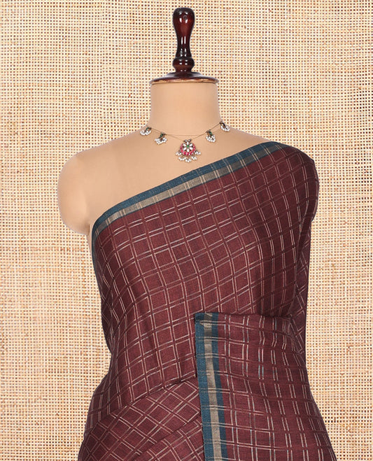 Brown Fancy Tussar Silk Saree, Embellished with Checked Design, Contrast Zari Piping Border, Pallu of Kalamkari Motifs, and Contrast Kalamkari Printed Blouse