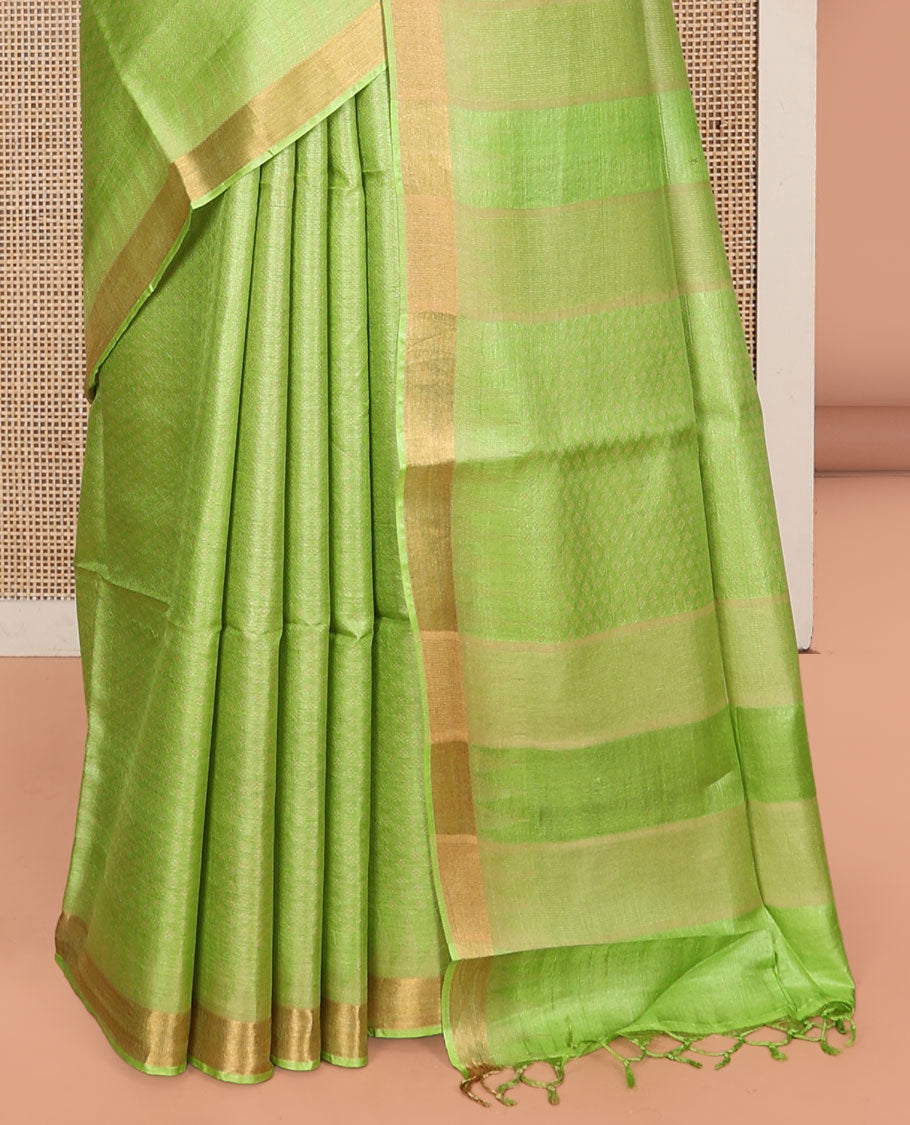 Parrot Green Sparsely Textured Tussar Silk Saree, a Subtle Piping Border, a Self-Pallu, and a Matching Blouse