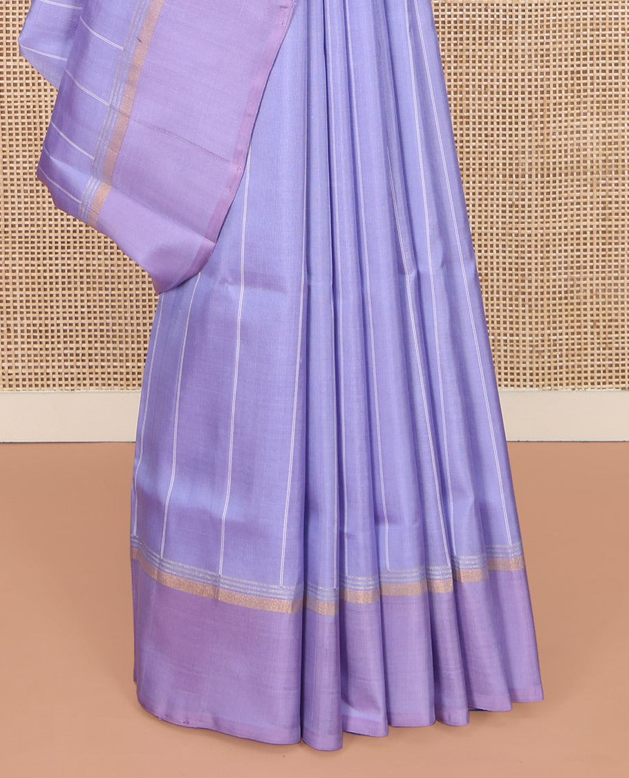 Lavender Uppada Silk Saree, Subtly Sparkled with Stripes All Over Its Body, Subtly Made Self-Border, Plain Pallu, and Paired with a Matching Blouse